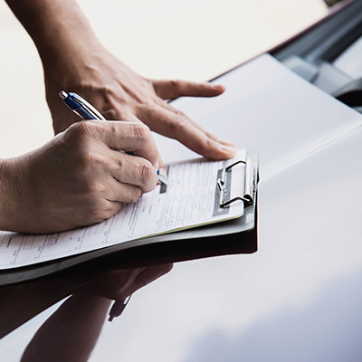 Man working with car maintenance checklist - people with car maintenance concept